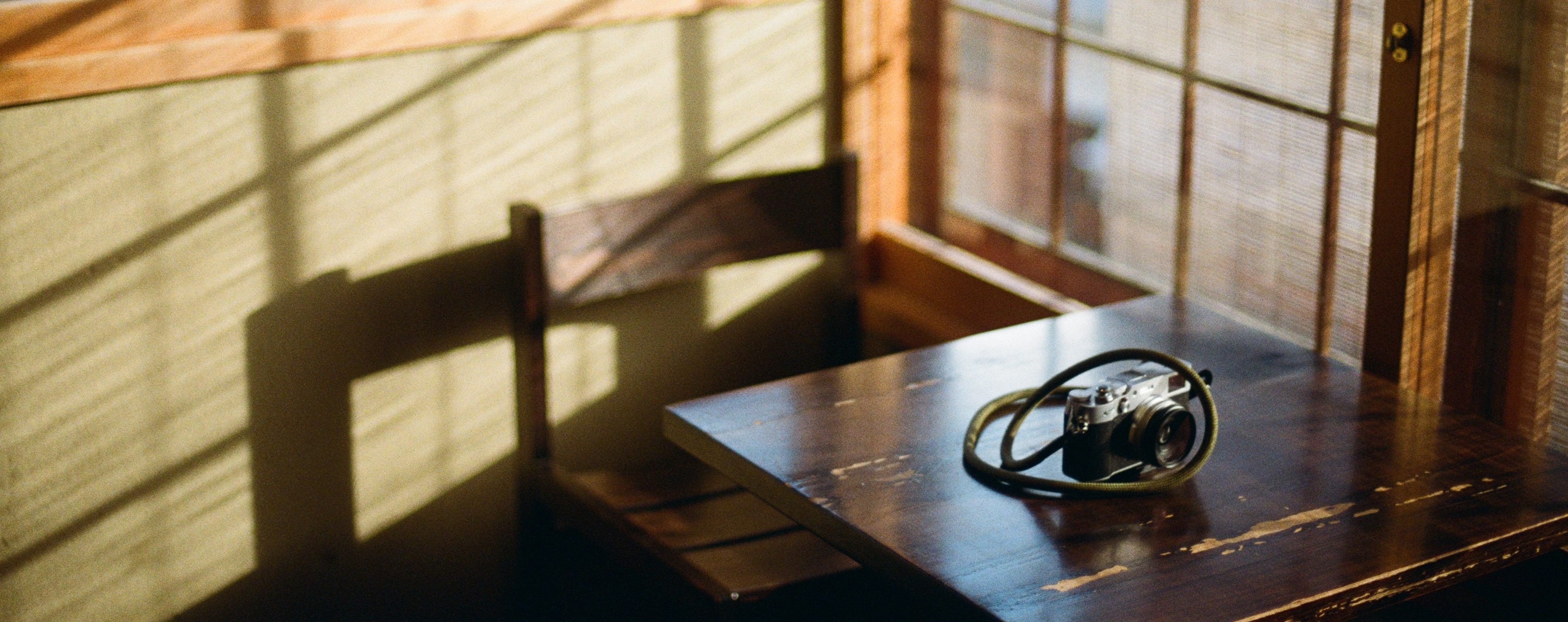 Japanese room with camera representing attention to detail and focus
